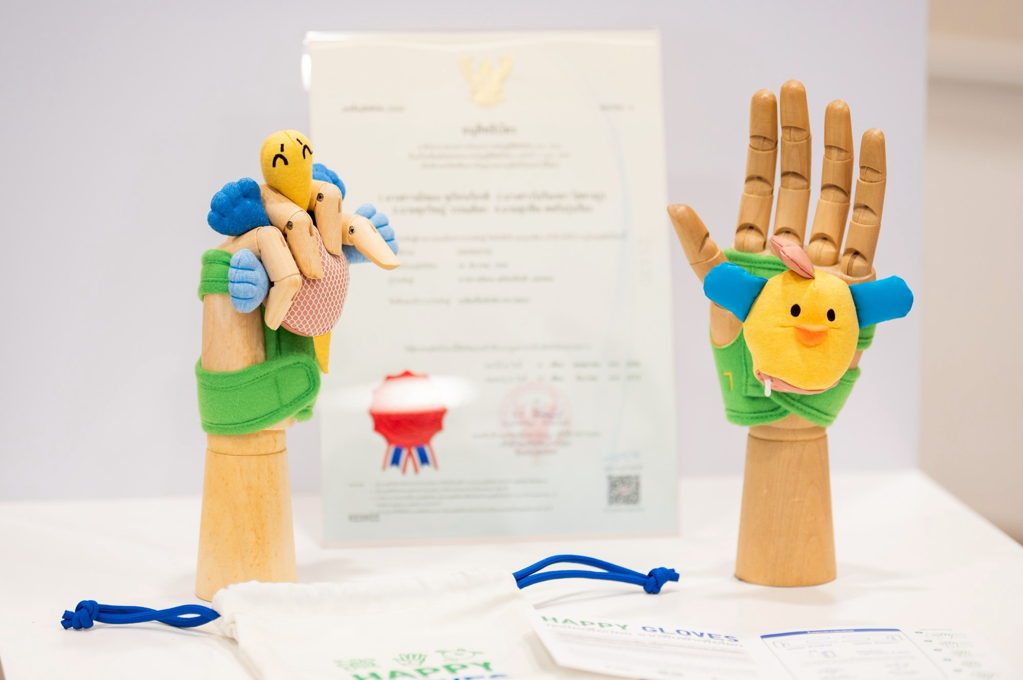 Chulalongkorn University and UNIQLO Launch Happy Gloves Project to Support Children with Cerebral Palsy 